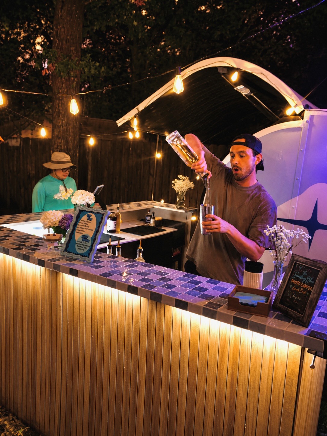 Founder Carlos Santiago pouring a cocktail at the Bar&Booth launch event.